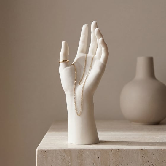 3D-printed hand sculpture styled as a jewelry stand