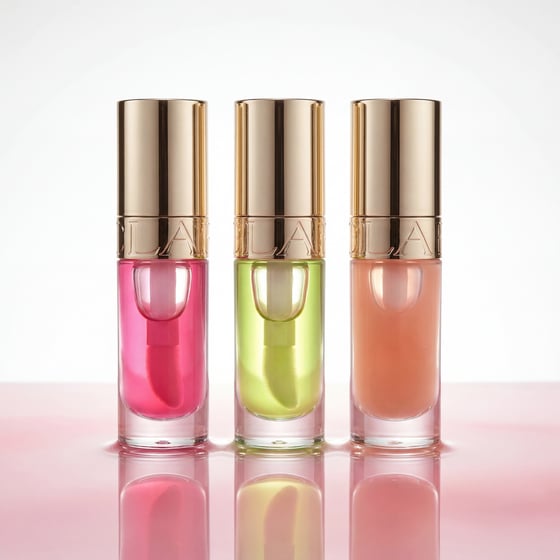 Jelly-finish lip oil set in a glossy candy scene