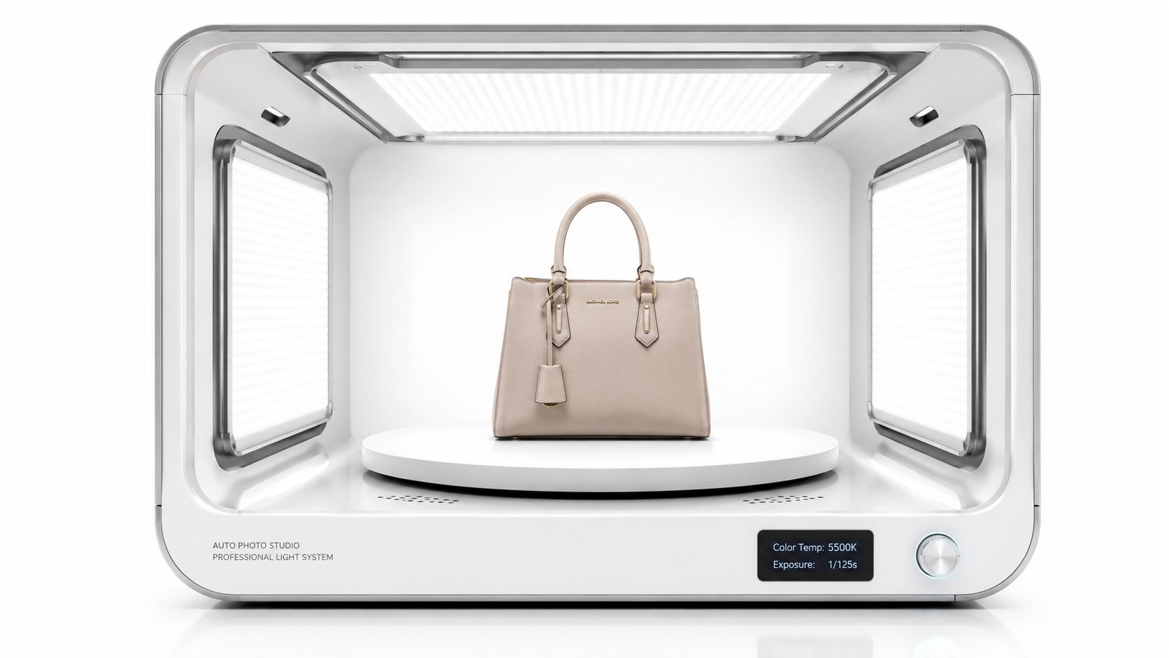A professional photography light booth containing a beige designer handbag on a rotating display platform.